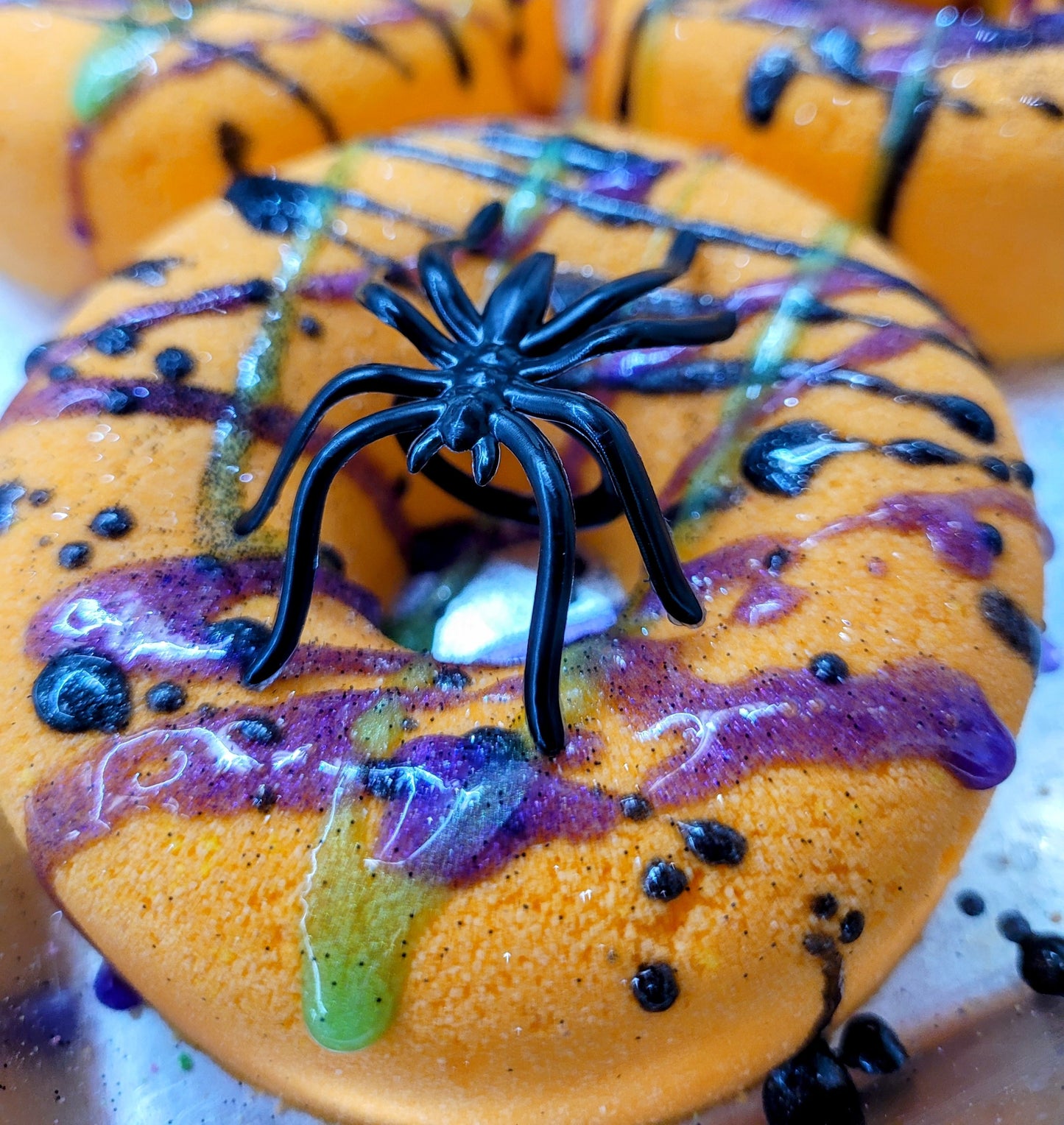 Spooktacular Soak with Our Spider Donut Bath Bomb!